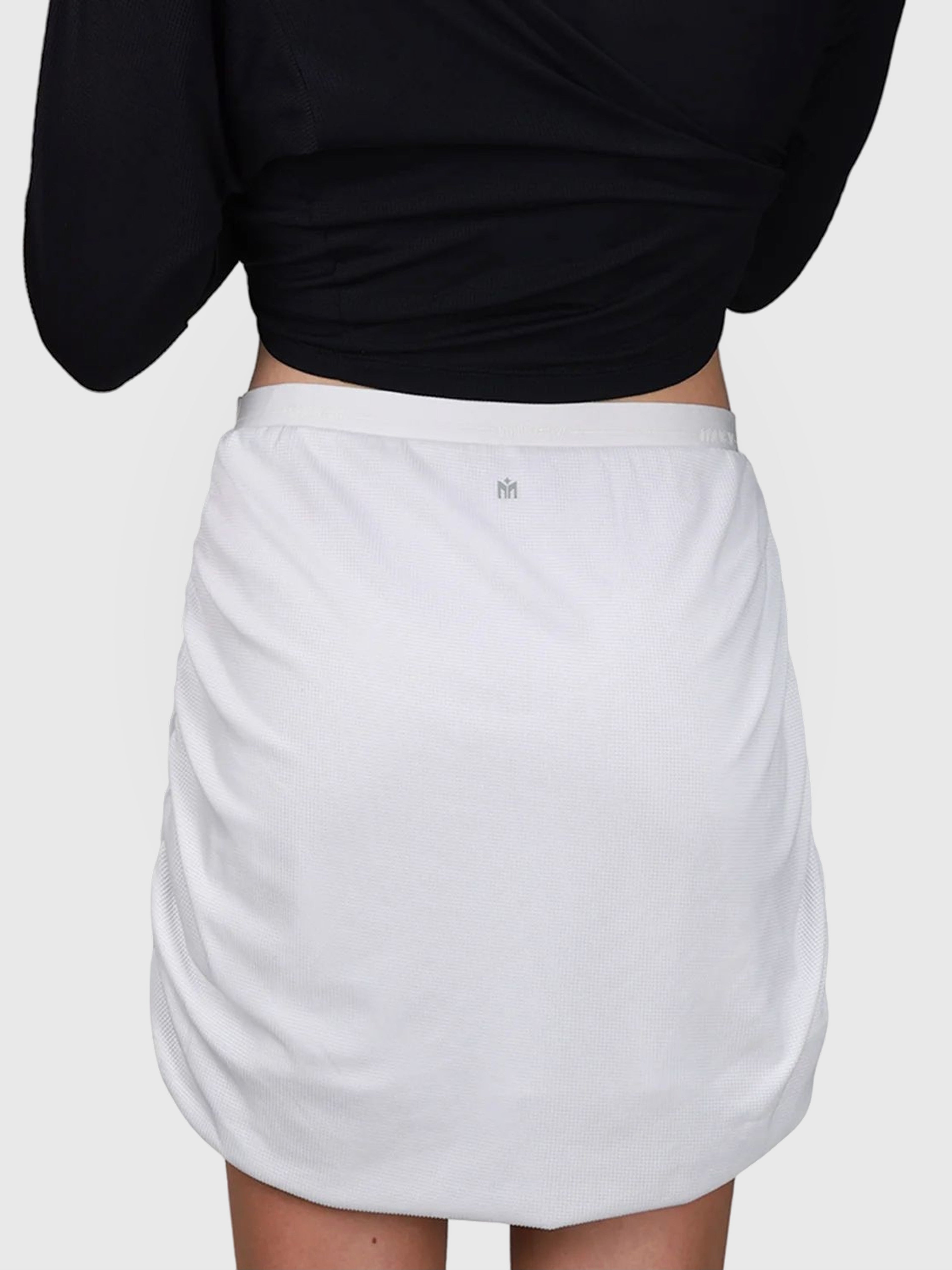 Back view of white Airy Twist Skort by MUEV designed as lightweight pickleball skort with subtle ruching detail
