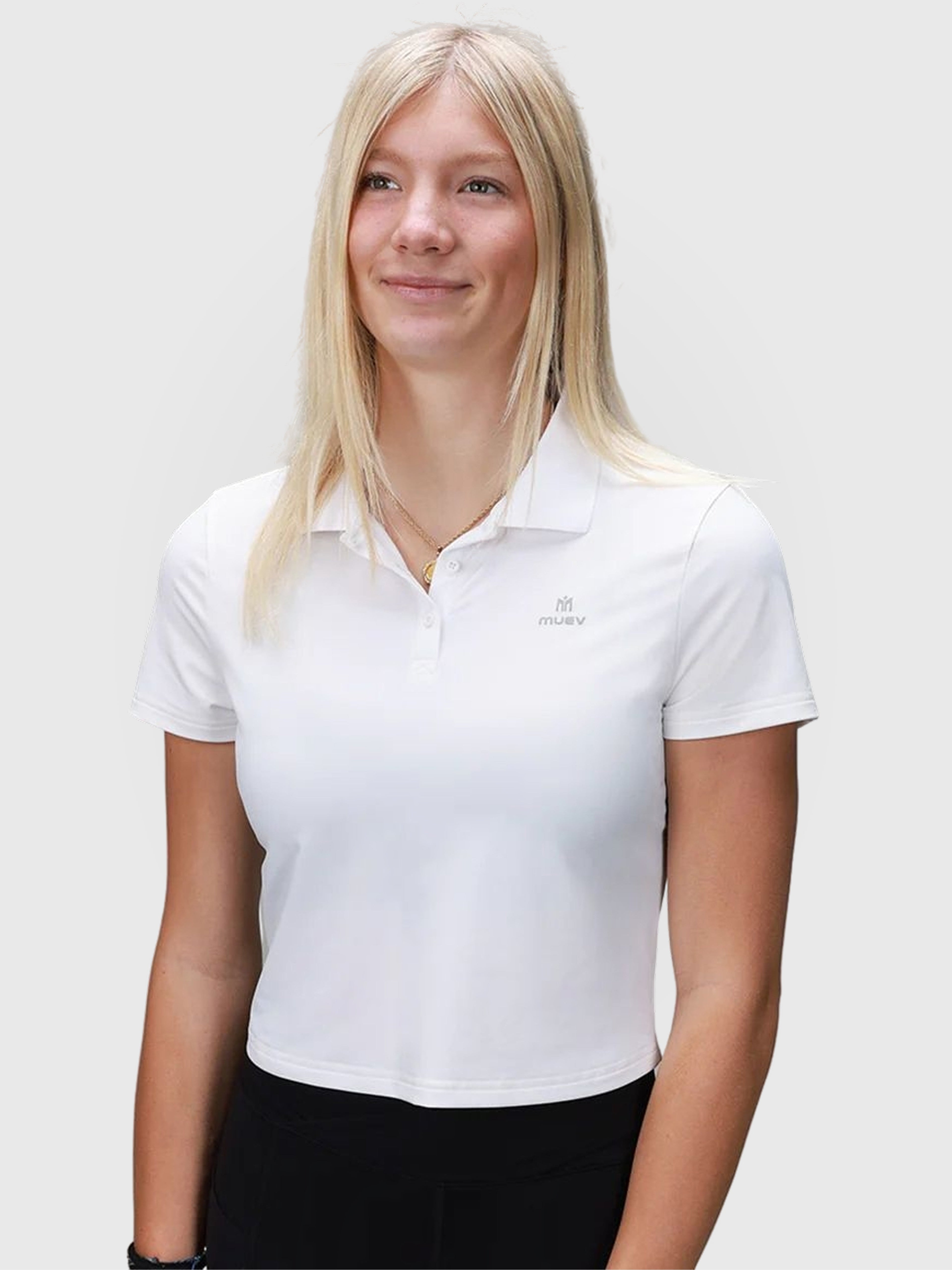 Woman wearing white Open Back Polo by MUEV designed for padel and pickleball clothing with a classic collar