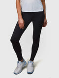 Front view of woman wearing black Court Legging by MUEV designed for padel and pickleball apparel
