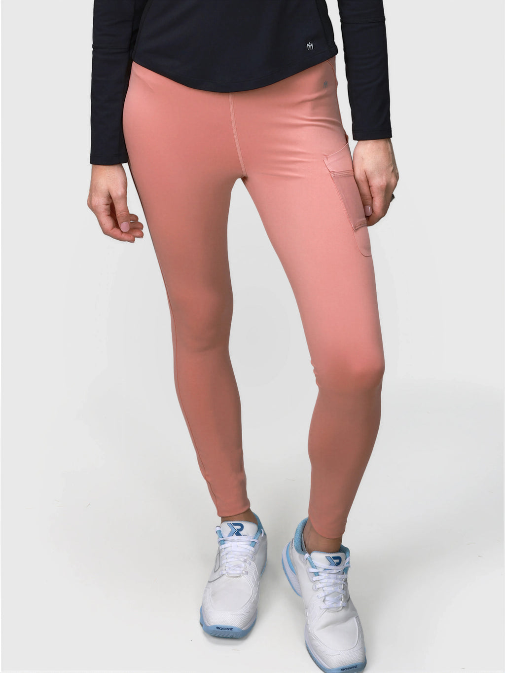 Front view of dusty pink Court Legging with side pocket in padel and pickleball apparel by MUEV