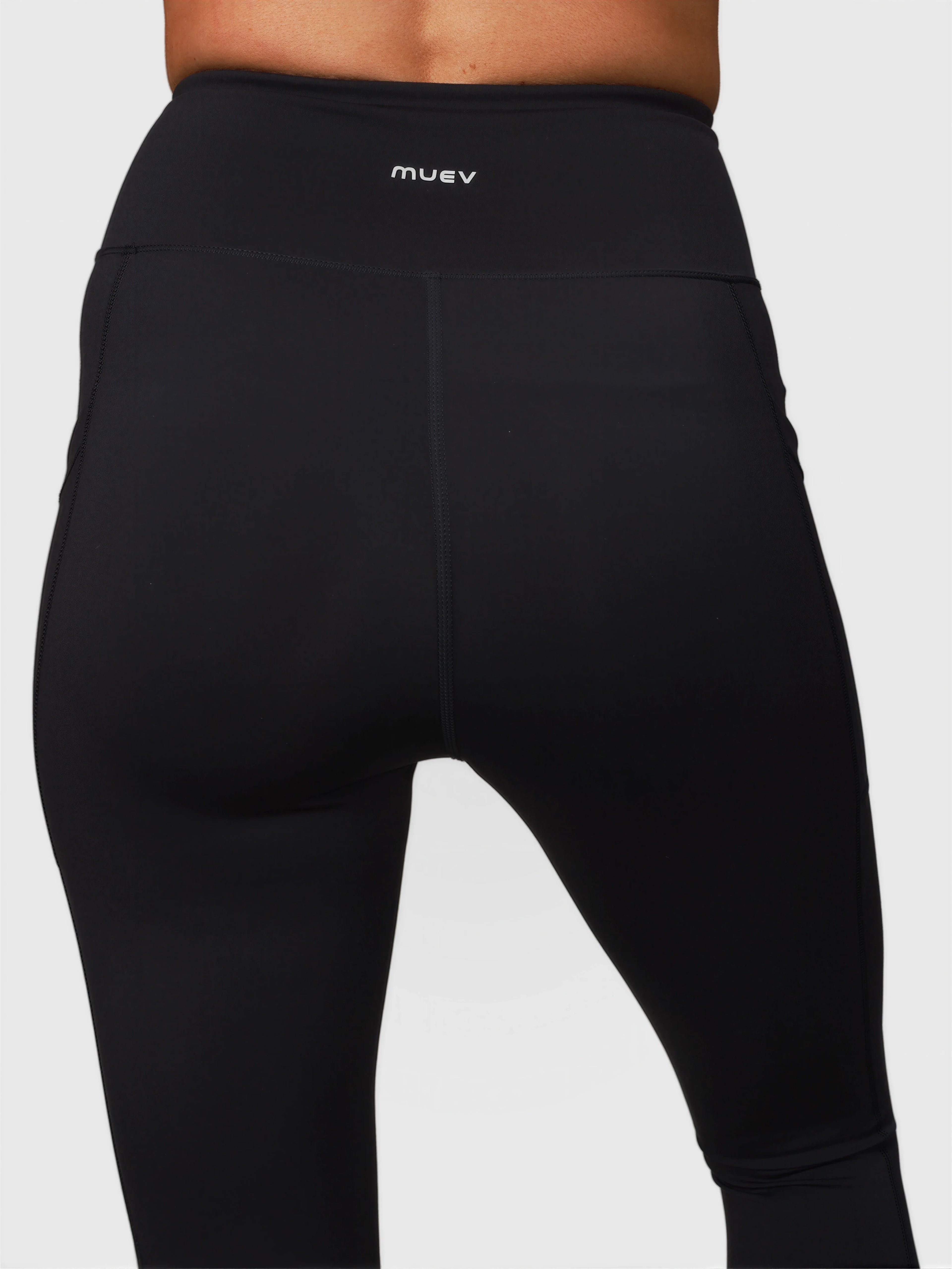 Back view of black V Cross Over Leggings by MUEV featuring a high waist for padel and pickleball apparel