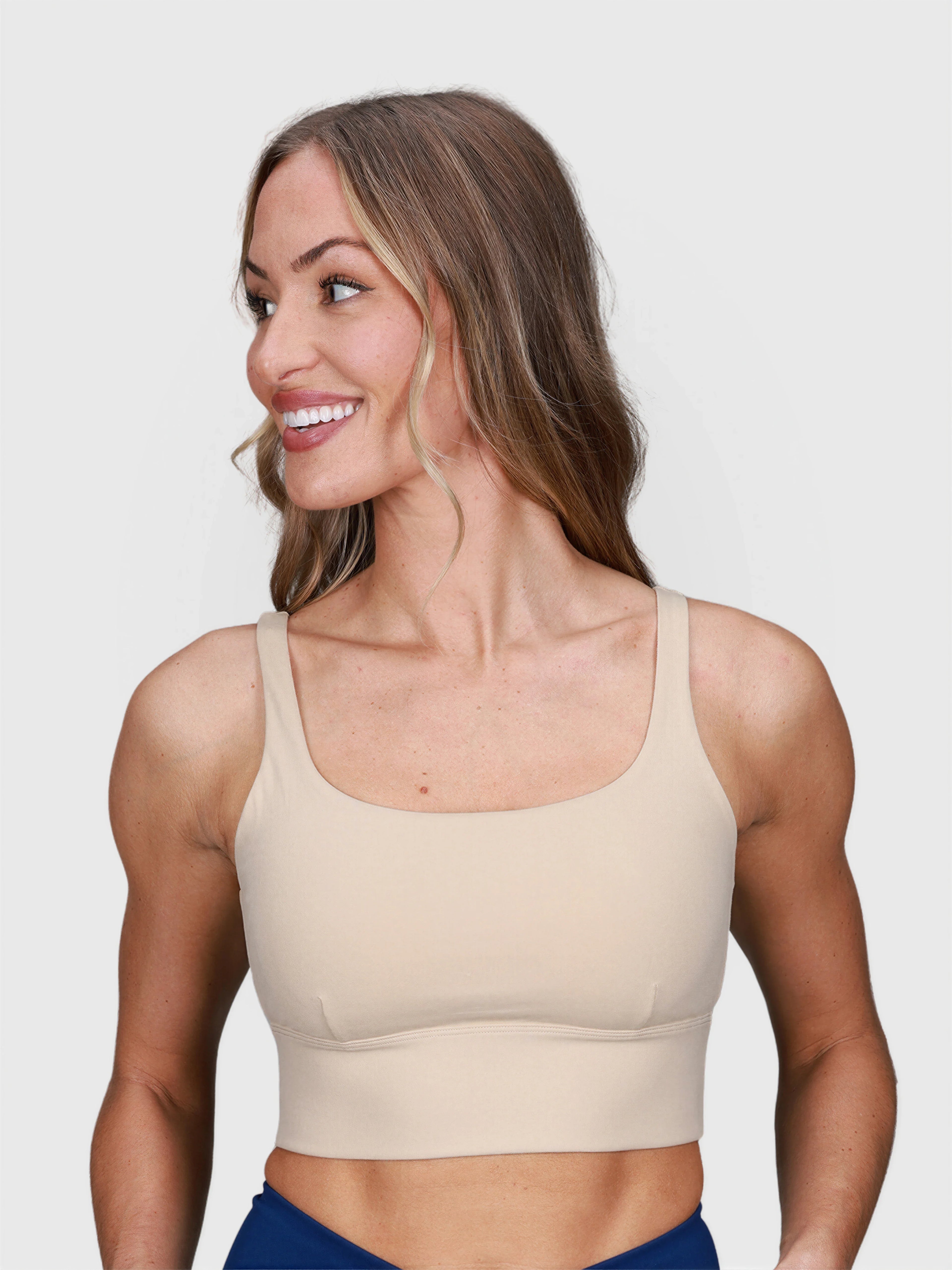 woman wearing khaki Long Line Sports Bra by MUEV for padel and pickleball apparel