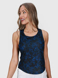 front view of woman wearing blue sakura Racerback Tank by MUEV for padel and pickleball apparel