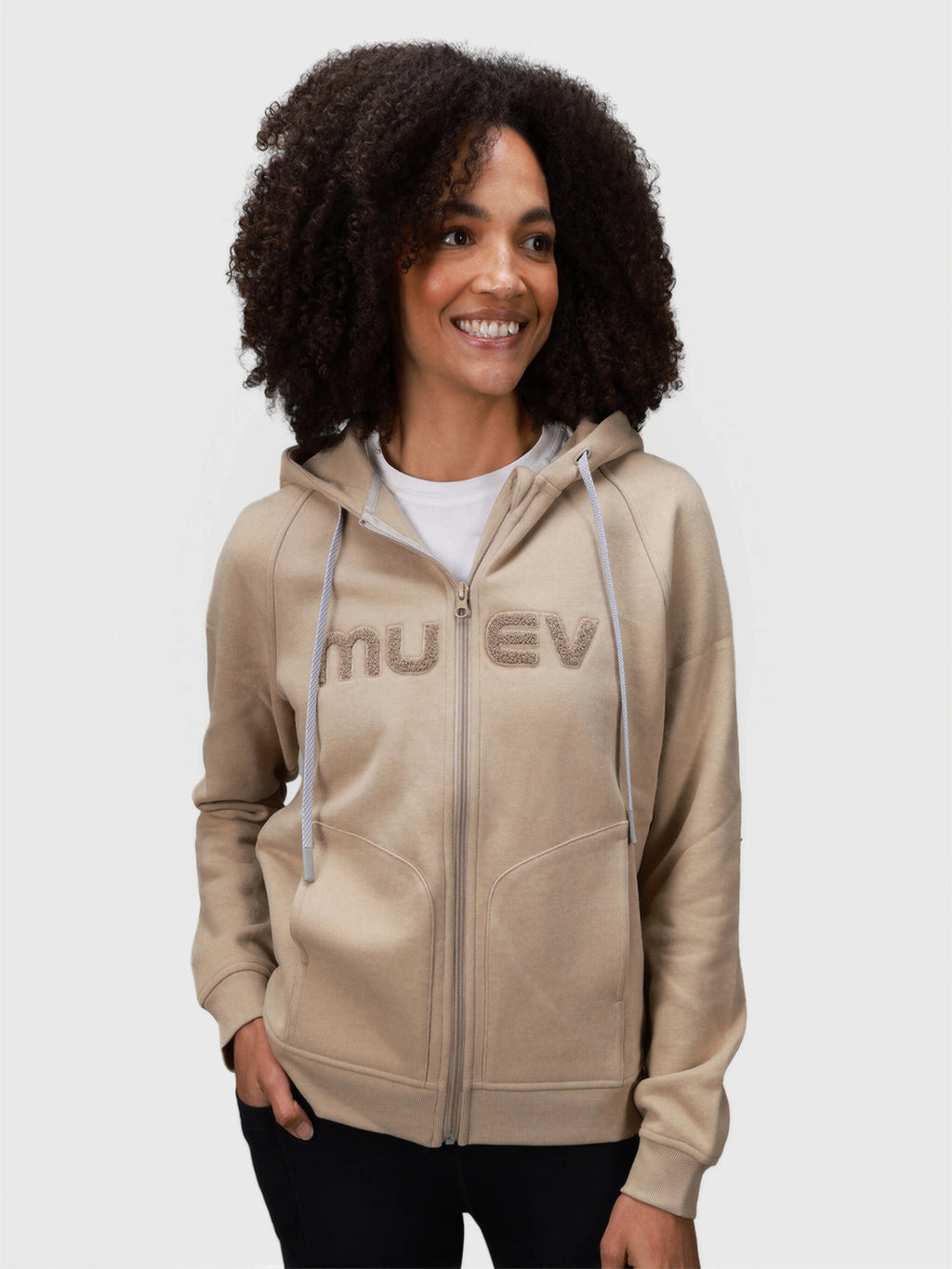 Woman wearing Khaki Women's Off Court Full Zip Hoodie by MUEV for padel and pickleball apparel