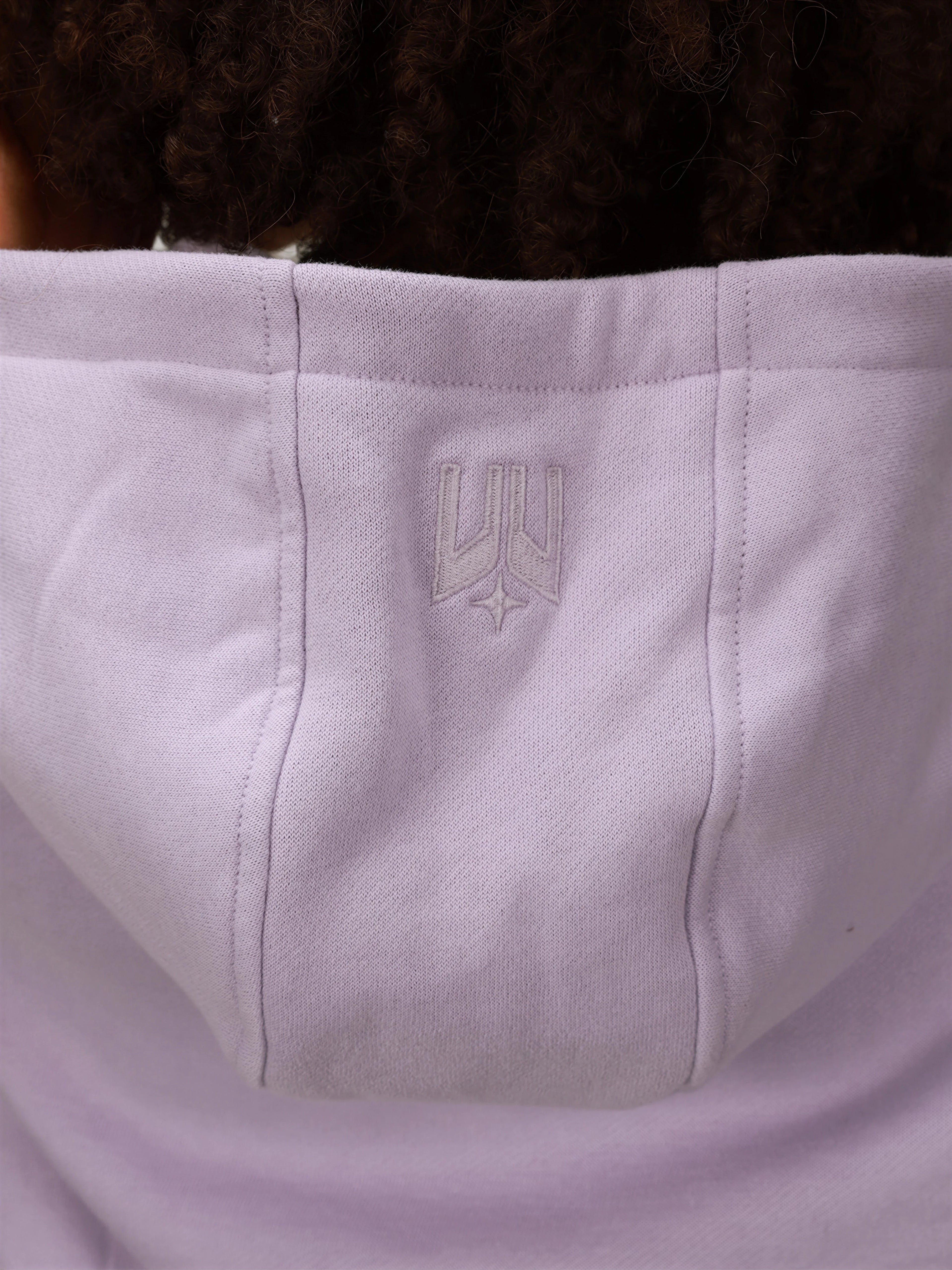 Close-up of lilac Women's Off Court Full Zip Hoodie hood with subtle embossed logo by MUEV for padel and pickleball apparel