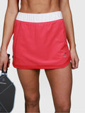 pink Performance Skort with white waistband designed for padel and pickleball apparel by MUEV